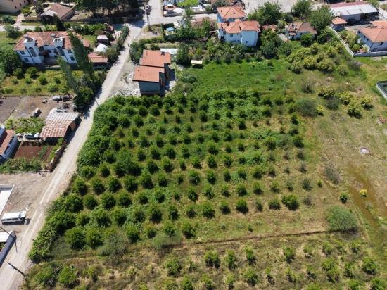 Land For Sale In Okçular, 1050m2, In The Village Residential Area.