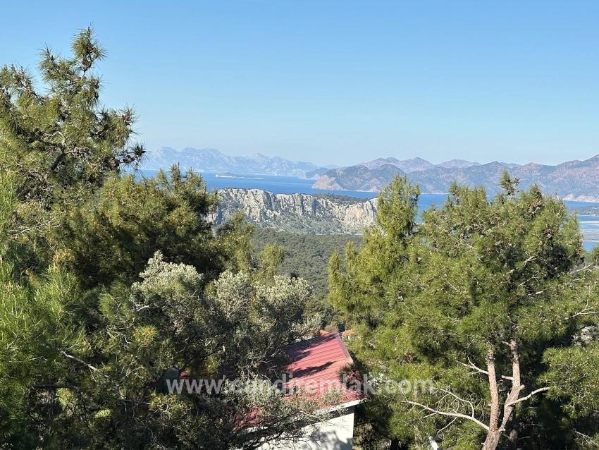 Gökbel'de Köy Yerleşik Alanı İçerisinde Deniz Manzaralı 1000m2 Satılık Arazi